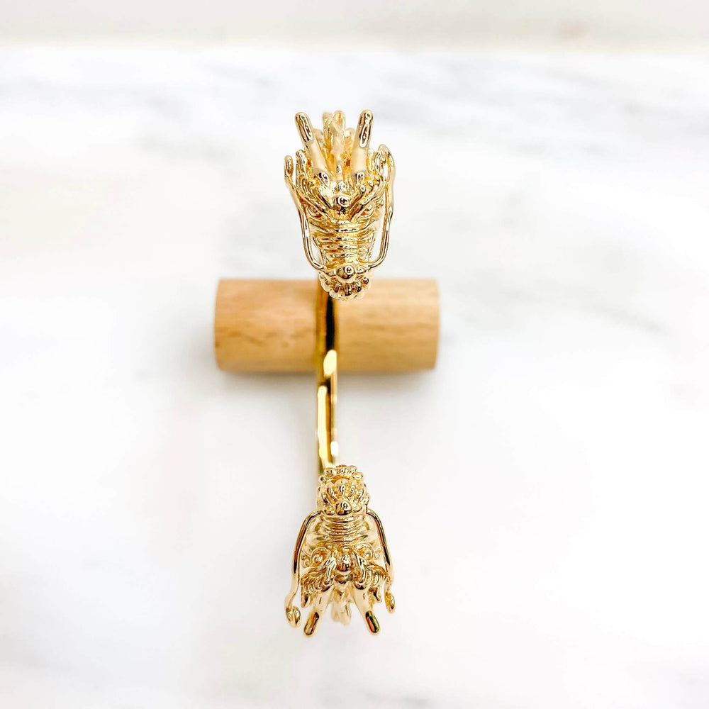 Bracelet tete de dragon plaqué or 